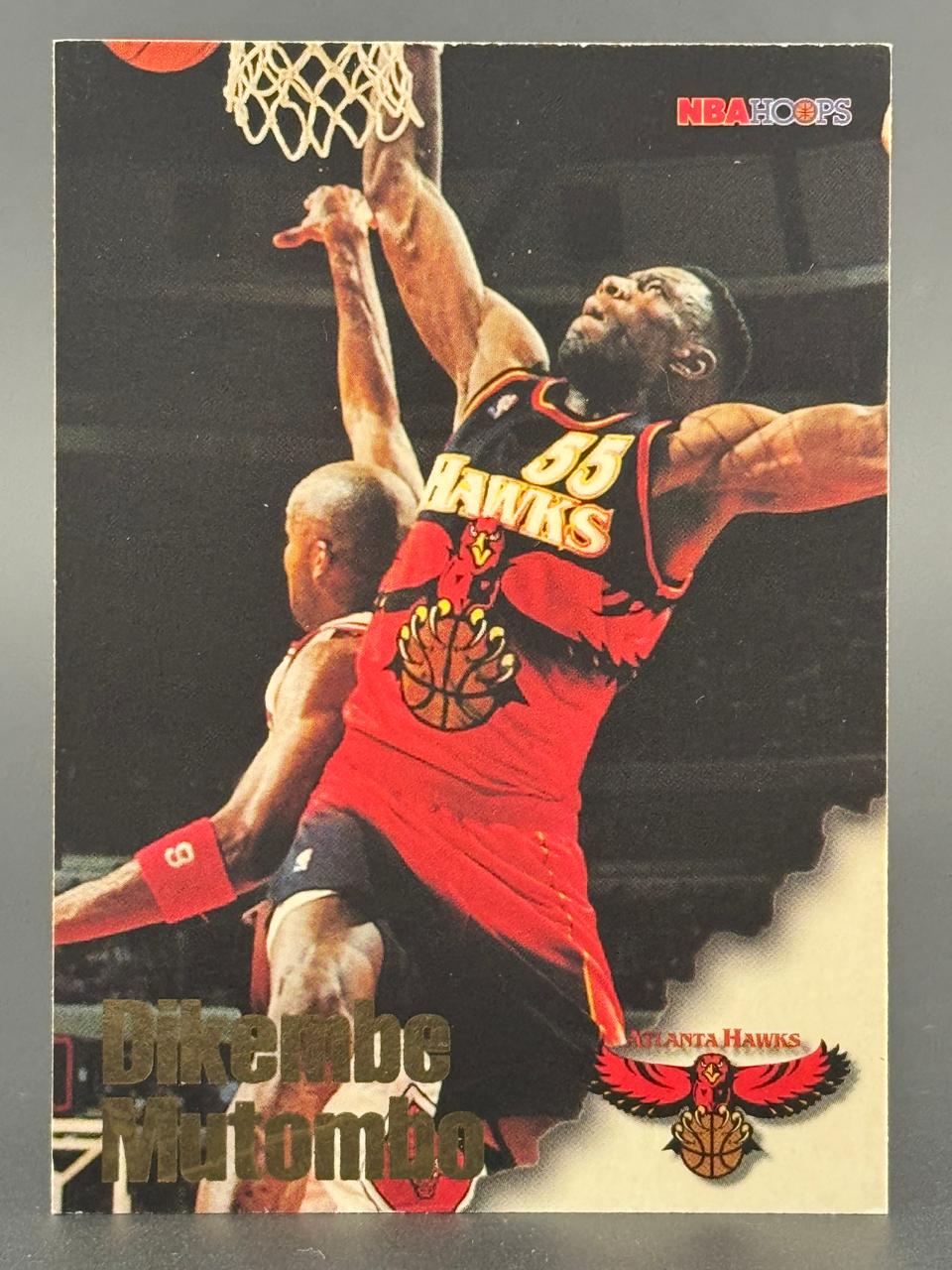 Dikembe Mutombo 1996-97 NBA Hoops trading card.