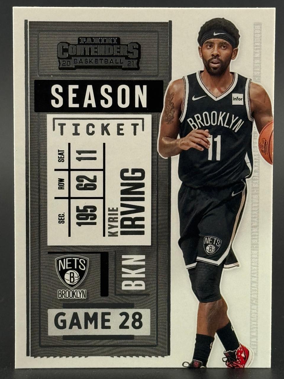2020-21 Panini Contenders Kyrie Irving trading card, Season Ticket variant, showing him in a Brooklyn Nets uniform.