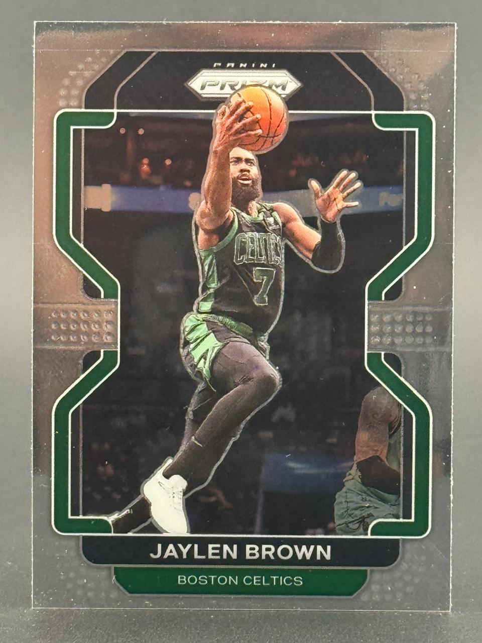 Jaylen Brown Panini Prizm trading card featuring the Boston Celtics player in a green jersey holding a basketball.