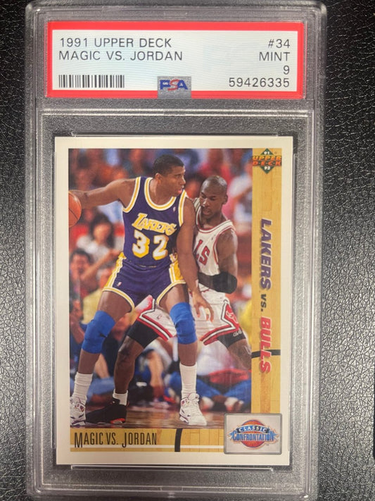 PSA 9 Mint 1991 Upper Deck Magic vs Jordan card #34, featuring Magic Johnson guarding Michael Jordan.