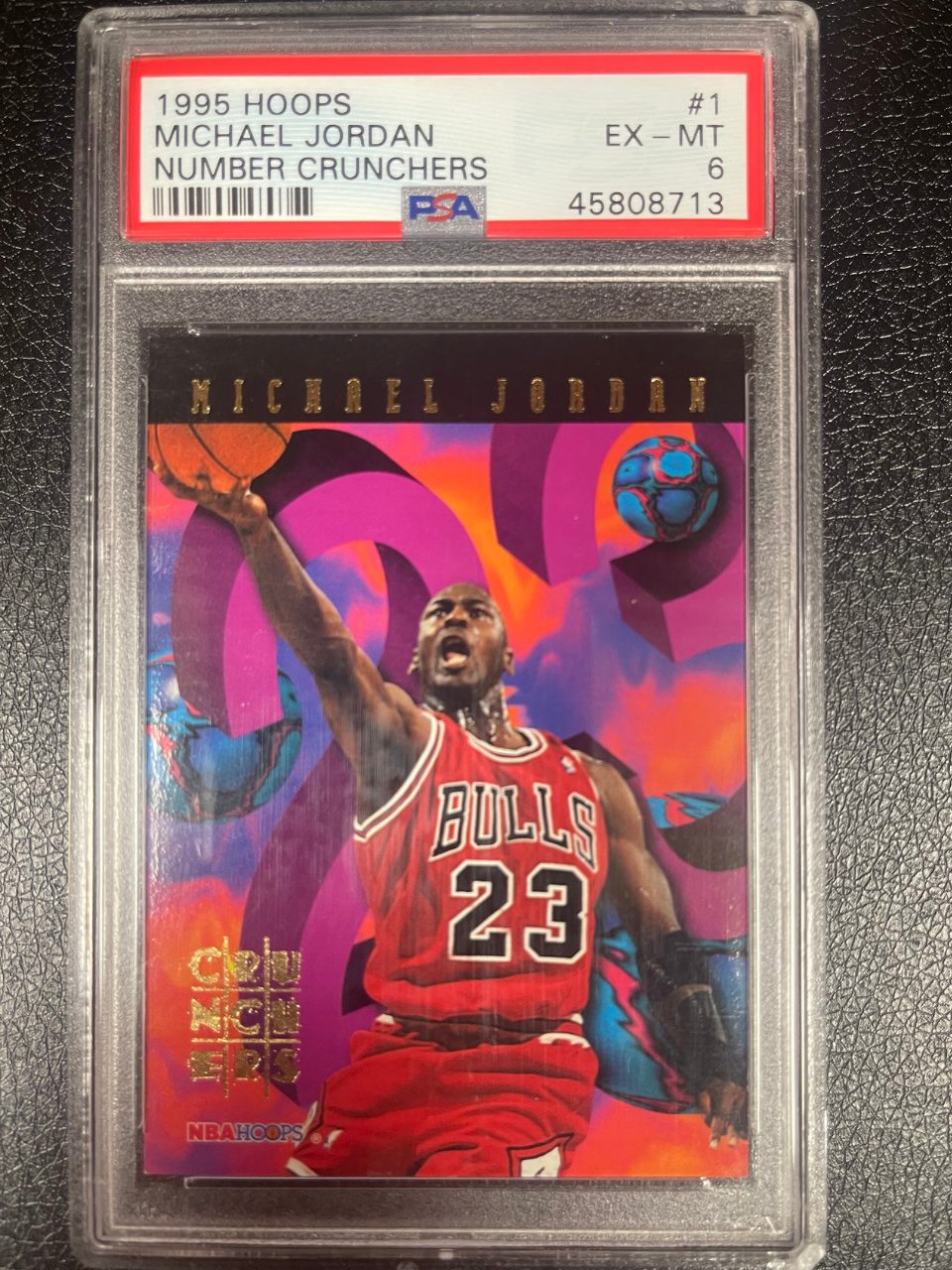 PSA 6 graded 1995 Hoops Michael Jordan Number Crunchers #1 trading card.