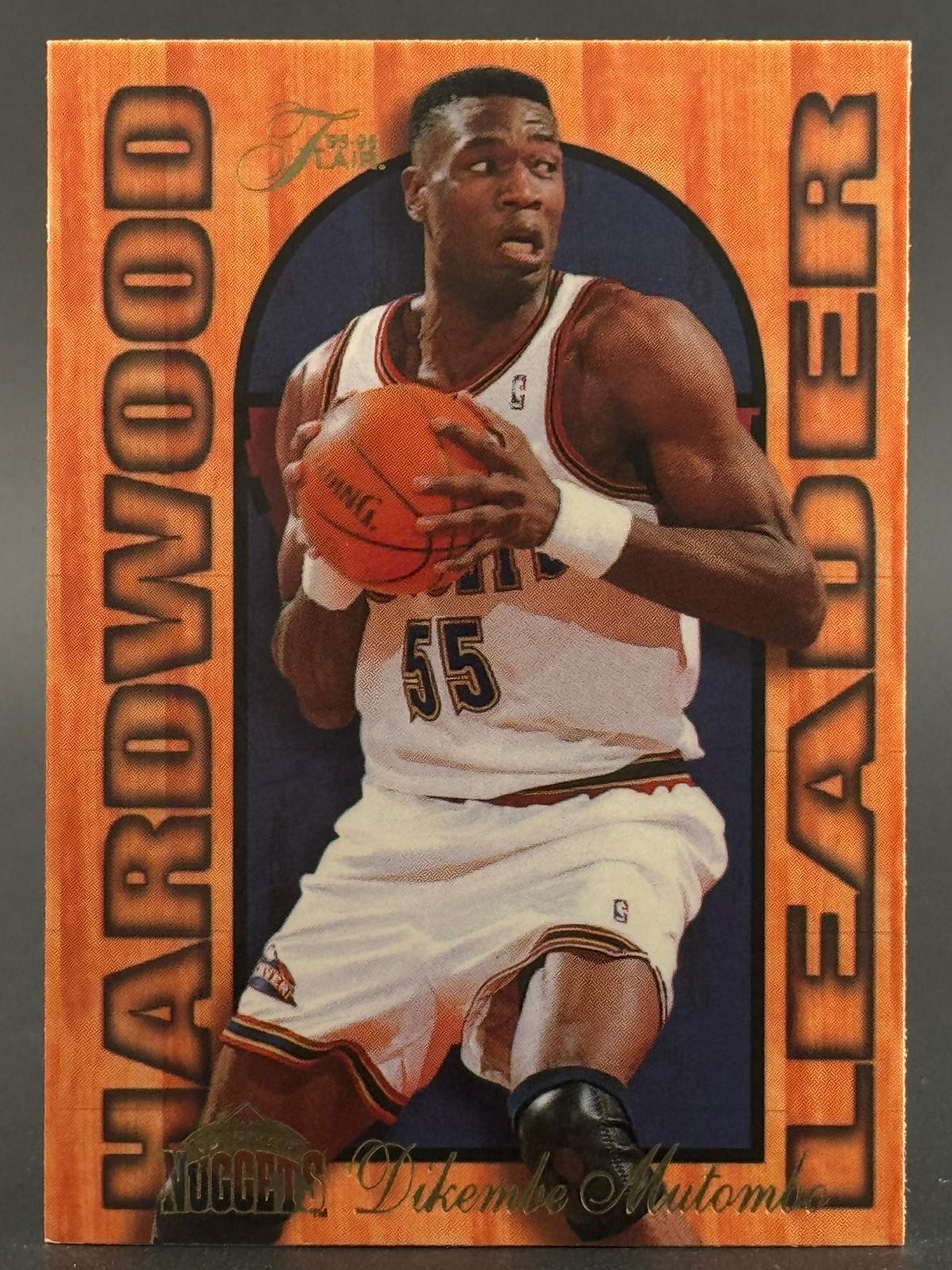 Dikembe Mutombo 1995-96 Fleer #7 of 27  Flair Hardwood Leader Numbered /27 front