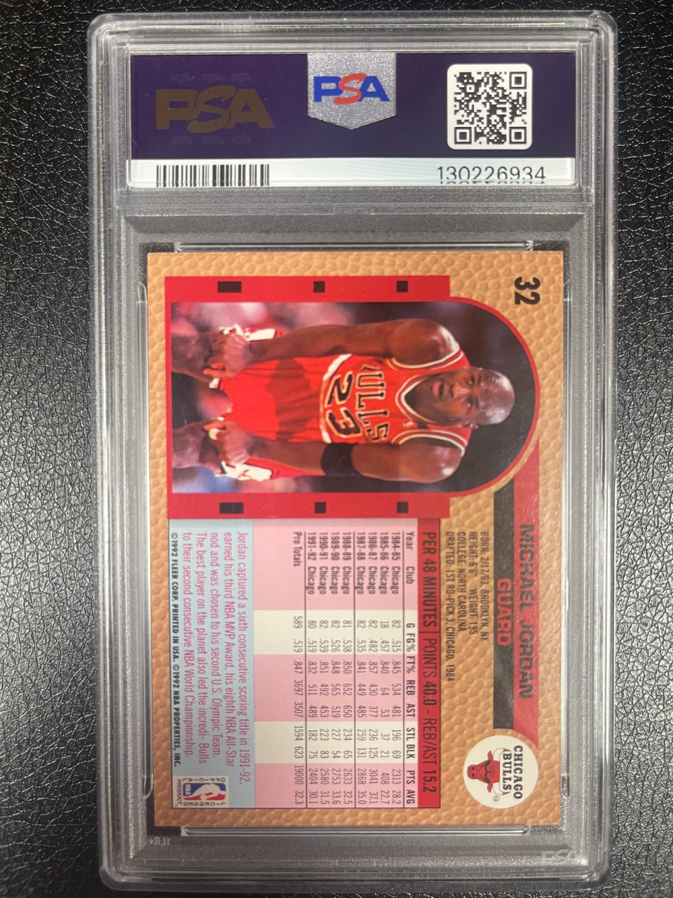 PSA-graded Michael Jordan 1992 Fleer card #32 showing card back, stats, and player profile.