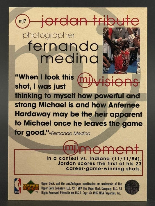 1997 Upper Deck Michael Jordan basketball card, number MJ7, reverse side with photo quote and text.