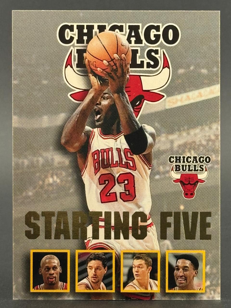 Michael Jordan 1990s Chicago Bulls Starting Five trading card with inset photos of teammates.