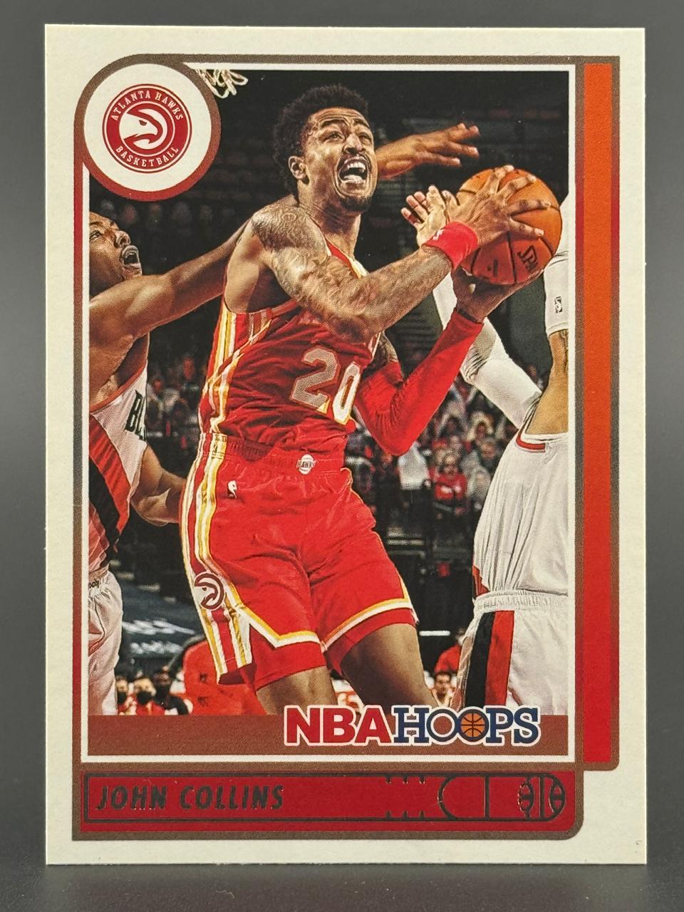 John Collins 2021-22 NBA Hoops basketball card.