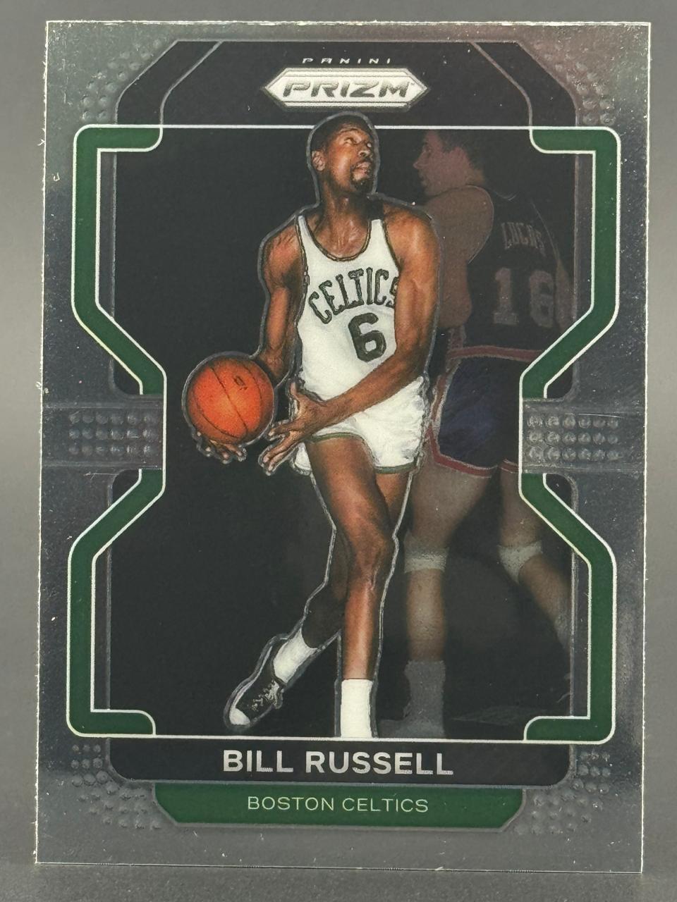 Panini Prizm basketball card of Bill Russell in a Boston Celtics uniform holding a basketball.