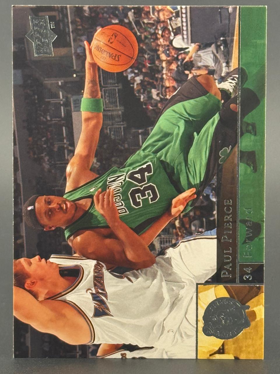 Paul Pierce 2002-03 Upper Deck basketball card #34, driving against a defender.