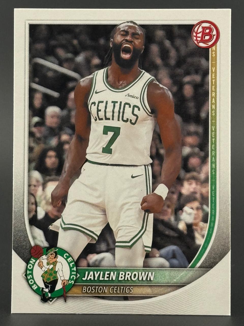 Jaylen Brown 2023-24 Bowman basketball trading card, showing him in a Celtics jersey celebrating.