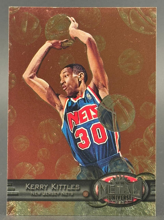 1997-98 Metal Universe Kerry Kittles trading card showing him in a Nets uniform shooting a basketball.