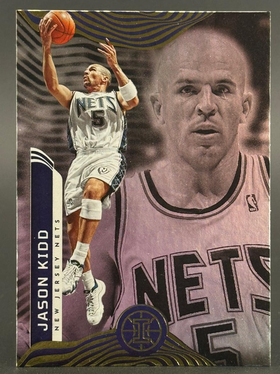 Jason Kidd trading card showing him in a New Jersey Nets uniform shooting a basketball.