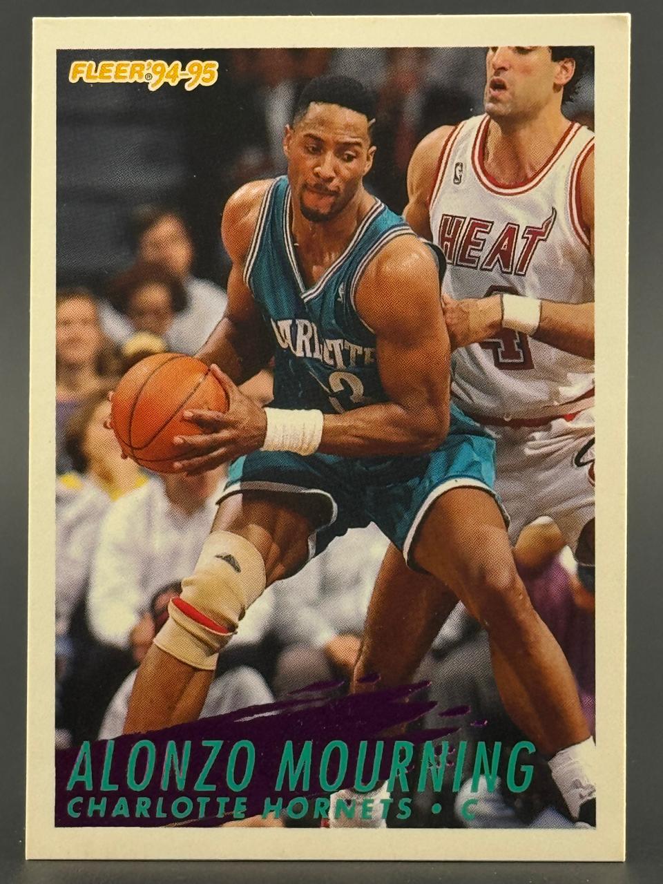 1994-95 Fleer Alonzo Mourning Charlotte Hornets basketball card.