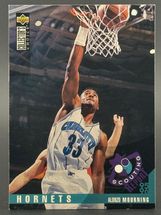1995-96 Upper Deck Collector's Choice Alonzo Mourning basketball card, showing him dunking.