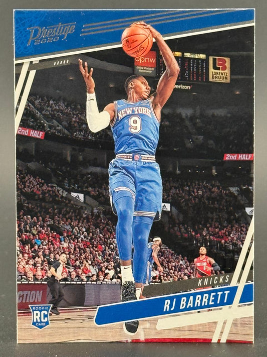 2020 Prestige RJ Barrett rookie basketball card featuring the Knicks player going for a layup.