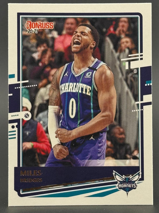 2020-21 Donruss Miles Bridges basketball card, showing him in a Hornets jersey, yelling with fists clenched.