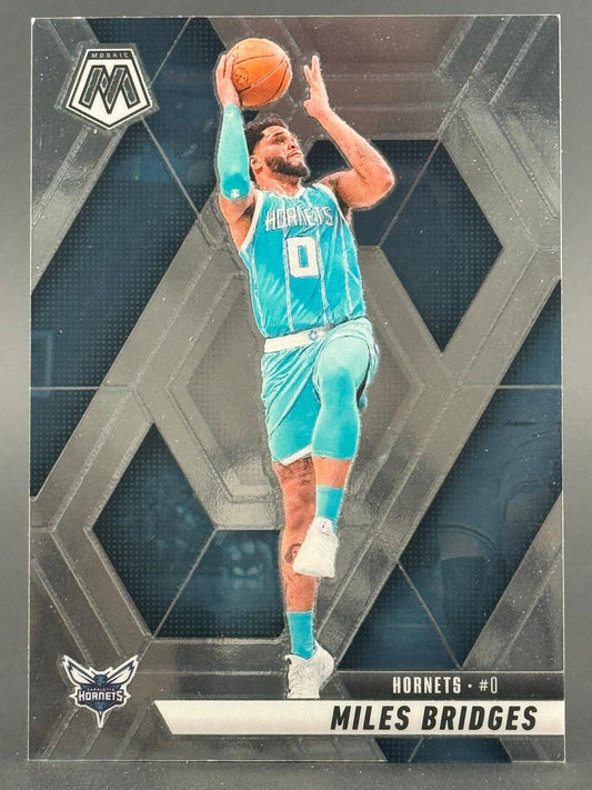 Miles Bridges trading card in a Hornets turquoise uniform, Mosaic set, shooting a basketball.