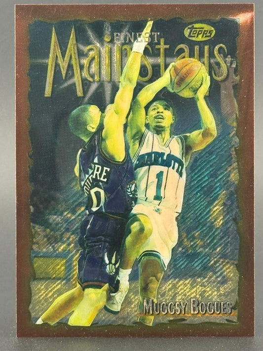 Muggsy Bogues 1996-97 Topps Finest Mainstays trading card showing him in a Charlotte Hornets uniform shooting a ball.