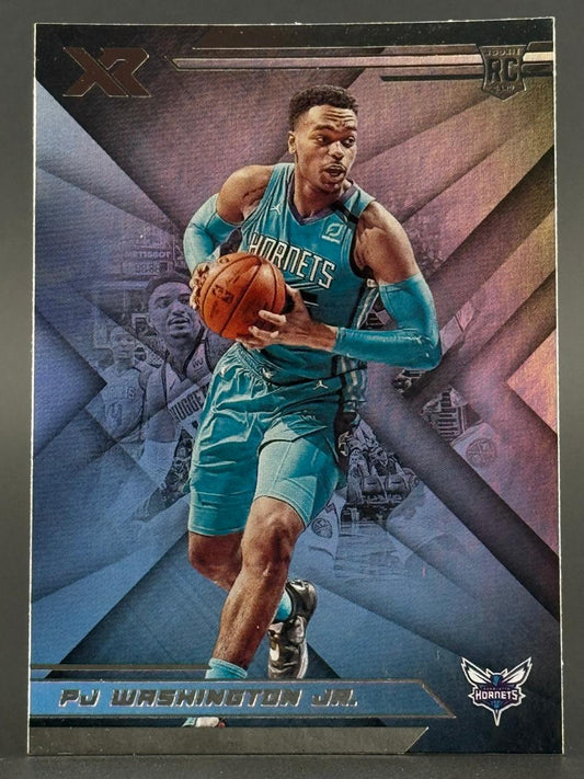 PJ Washington Jr. trading card, Panini XR, rookie card, holding basketball in Hornets uniform.