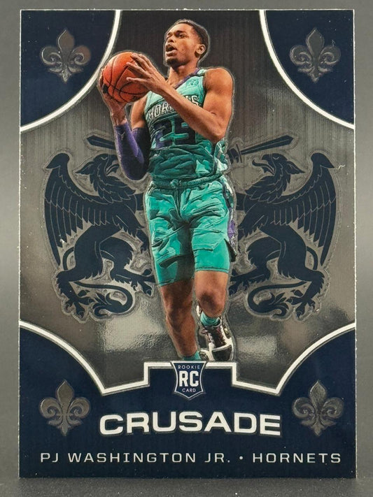 PJ Washington Jr. Hornets Crusade trading card holding a basketball with a rookie card logo.