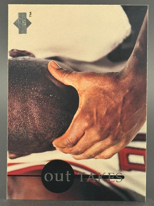 Upper Deck Out Takes trading card featuring a hand resting on a person's head.