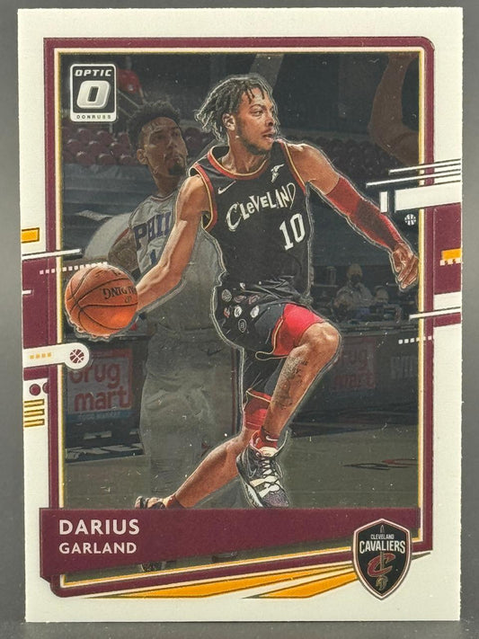 Darius Garland 2021-22 Donruss Optic basketball card dribbling in uniform.