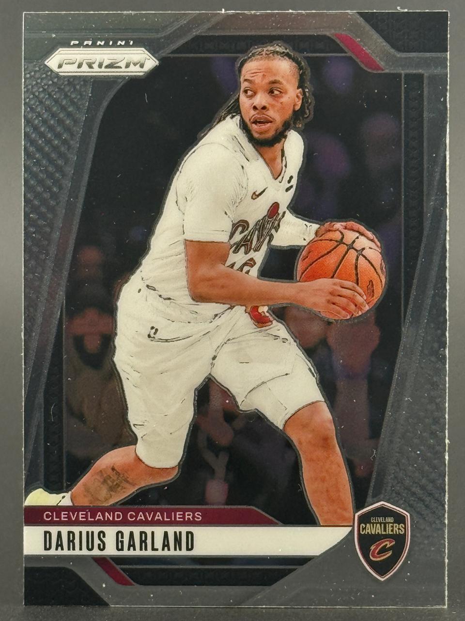 Darius Garland 2022-23 Panini Prizm Cleveland Cavaliers basketball card holding a basketball.
