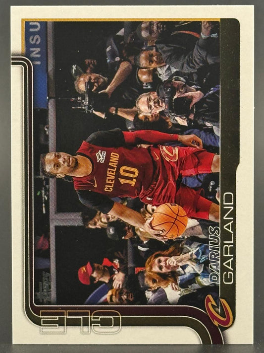 Darius Garland basketball trading card, Cleveland 10 jersey, dribbling past crowd.