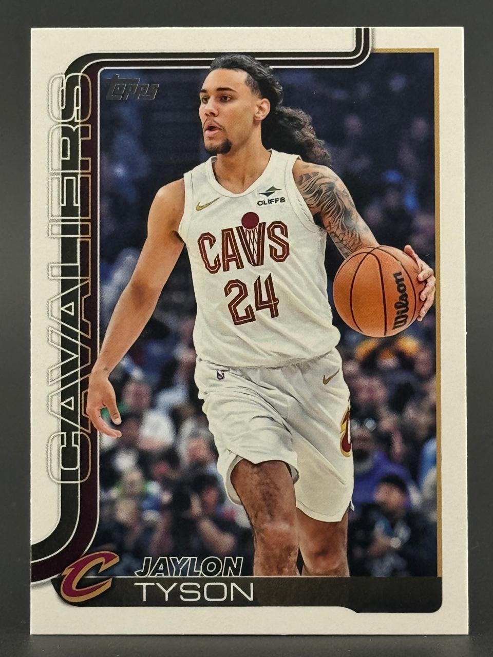 Jaylon Tyson basketball trading card in Cavs uniform dribbling a ball.