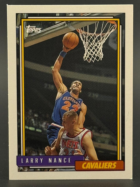 Topps basketball card featuring Cleveland Cavaliers player Larry Nance dunking.