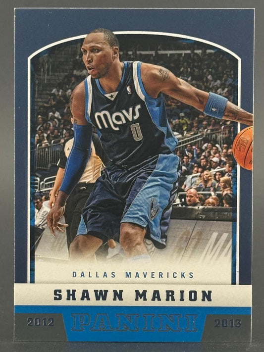 2012-13 Panini Shawn Marion trading card featuring the Dallas Mavericks player dribbling a basketball.