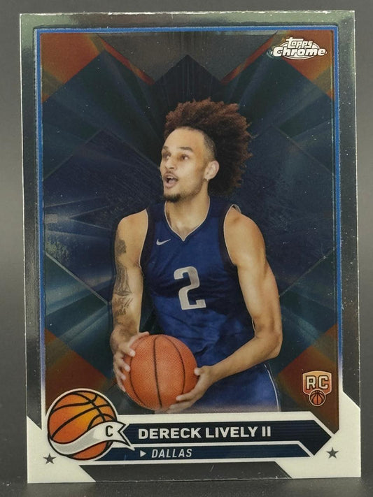 Dereck Lively II basketball trading card featuring him holding a basketball in a Topps Chrome set.