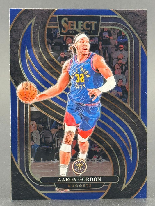 2024-25 Panini Select Aaron Gordon trading card with blue background and swirling gold design.