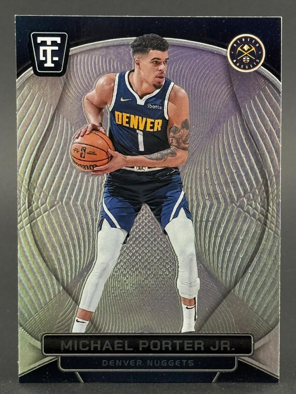 Michael Porter Jr. basketball trading card, showing him in a Denver Nuggets uniform holding a basketball.