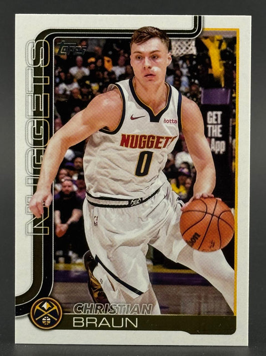 Christian Braun Topps basketball card, depicting him dribbling in a Nuggets uniform.