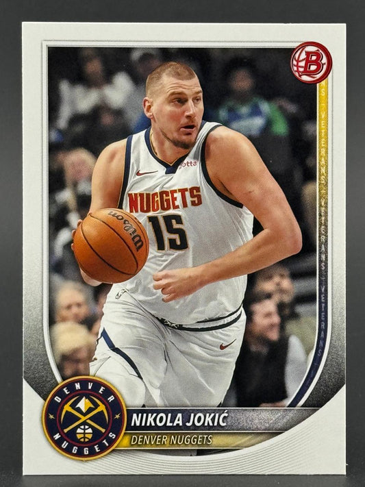 Nikola Jokić basketball trading card, holding a basketball in a Denver Nuggets jersey.