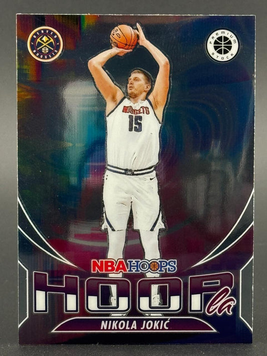 Nikola Jokić NBA Hoops trading card, showing him in a Denver Nuggets uniform shooting a basketball.