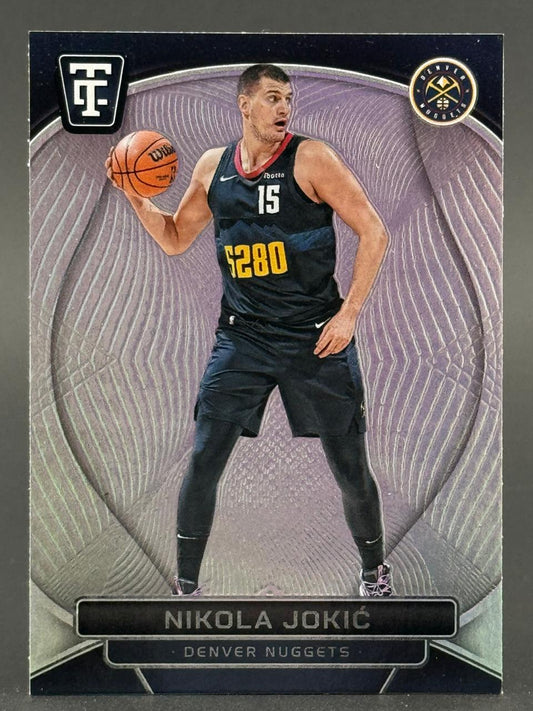 Nikola Jokić basketball trading card in a Denver Nuggets uniform holding a basketball.