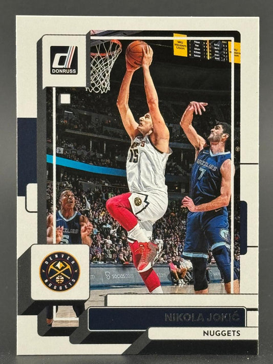 Nikola Jokic 2021-22 Donruss basketball card featuring him driving to the basket.