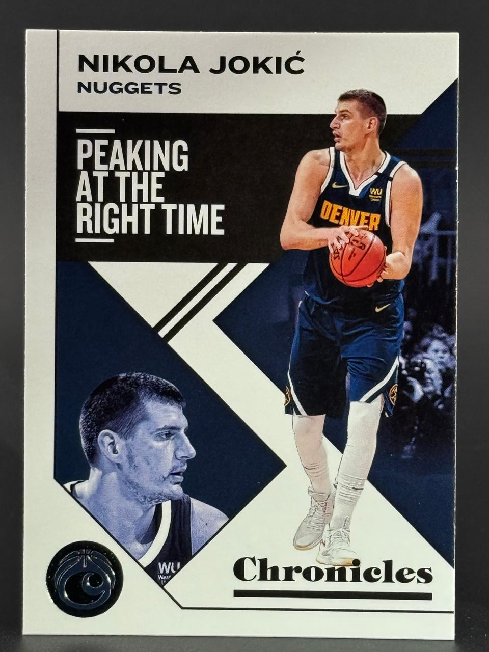Nikola Jokić basketball trading card, Chronicles set, featuring "Peaking at the Right Time" text.