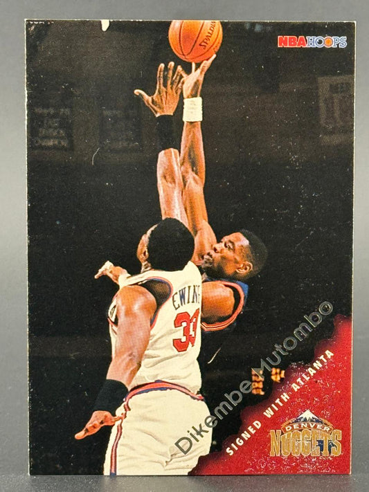 Dikembe Mutombo 1996 NBA Hoops basketball card.