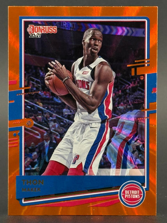 2020-21 Donruss Thon Maker basketball card, Detroit Pistons uniform, orange laser parallel.