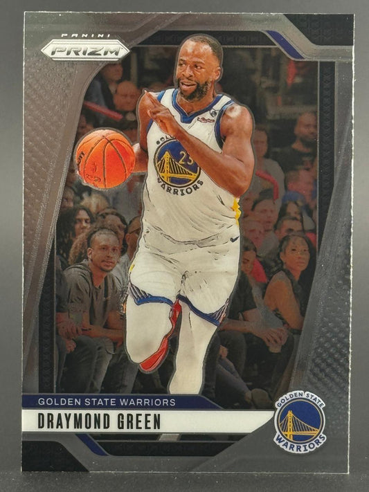 Draymond Green Panini Prizm trading card with a silver border, showing him dribbling a basketball.