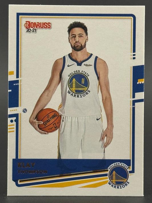 2020-21 Donruss Klay Thompson basketball card #11 holding a basketball.