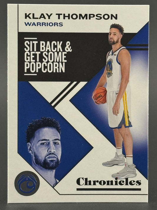 Klay Thompson Chronicles trading card with "Sit Back & Get Some Popcorn" text.