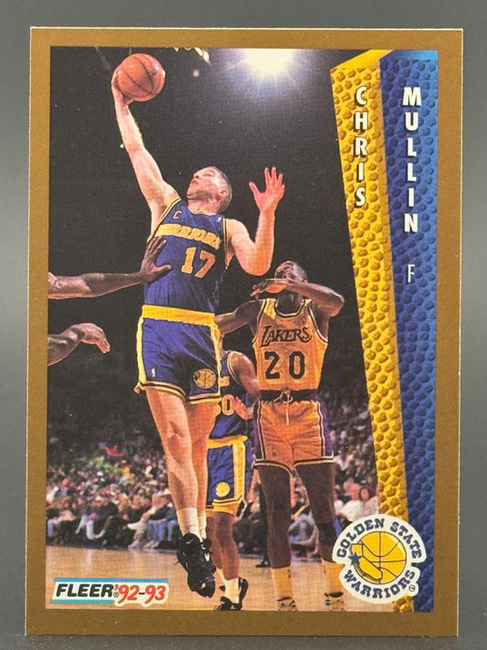 1992-93 Fleer Chris Mullin basketball card featuring Mullin in a Warriors uniform driving to the basket.