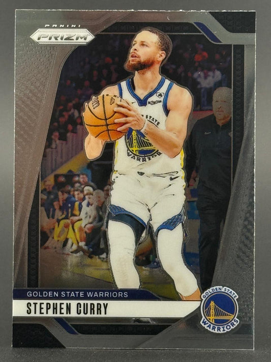 Stephen Curry 2021 Panini Prizm trading card holding basketball in Golden State Warriors uniform.