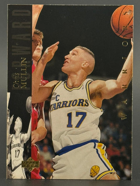 Chris Mullin trading card showing him in a Golden State Warriors #17 jersey reaching for a basketball.
