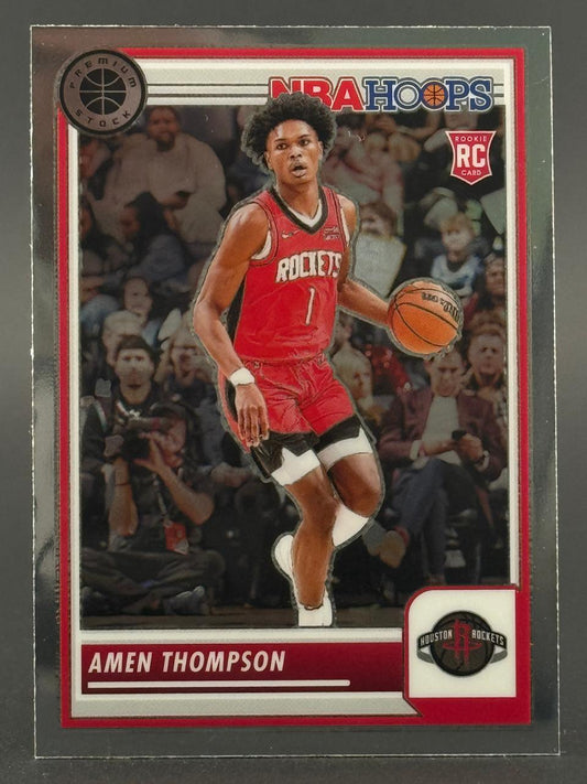 Amen Thompson 2023-24 NBA Hoops Premium Stock rookie card dribbling a basketball.