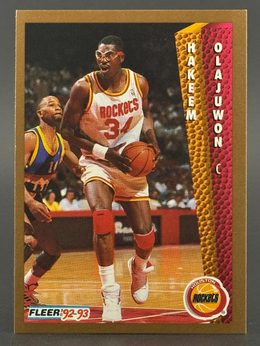 1992-93 Fleer Hakeem Olajuwon basketball card #34 in Rockets uniform.