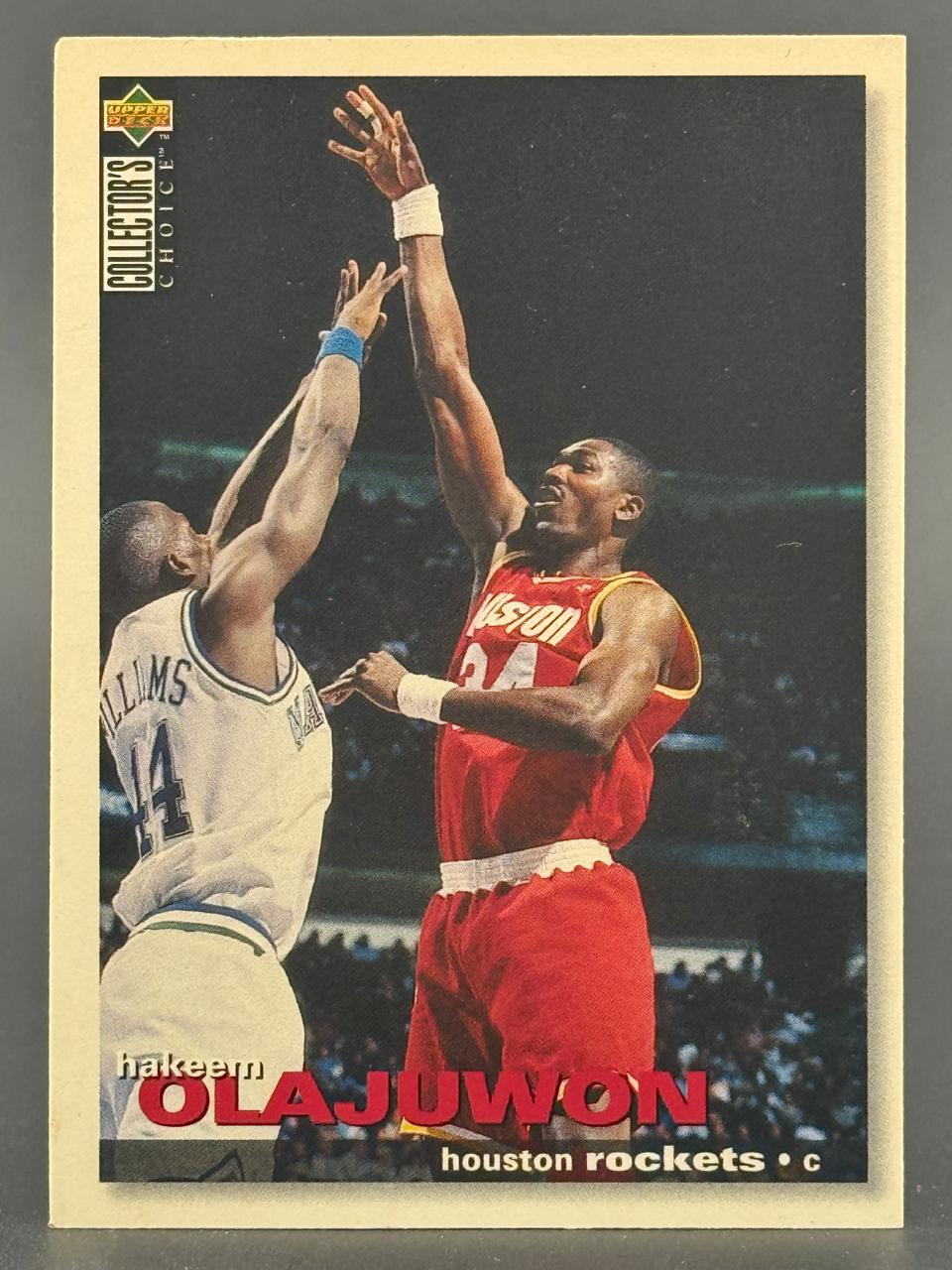 1994 Upper Deck Collector's Choice Hakeem Olajuwon Houston Rockets basketball trading card.